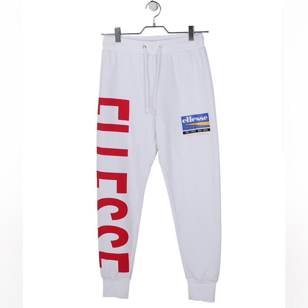 ellesse joggers in white with red lettering and logo